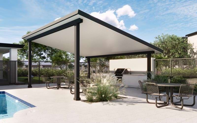 Covered poolside patio at Zenn Skyview