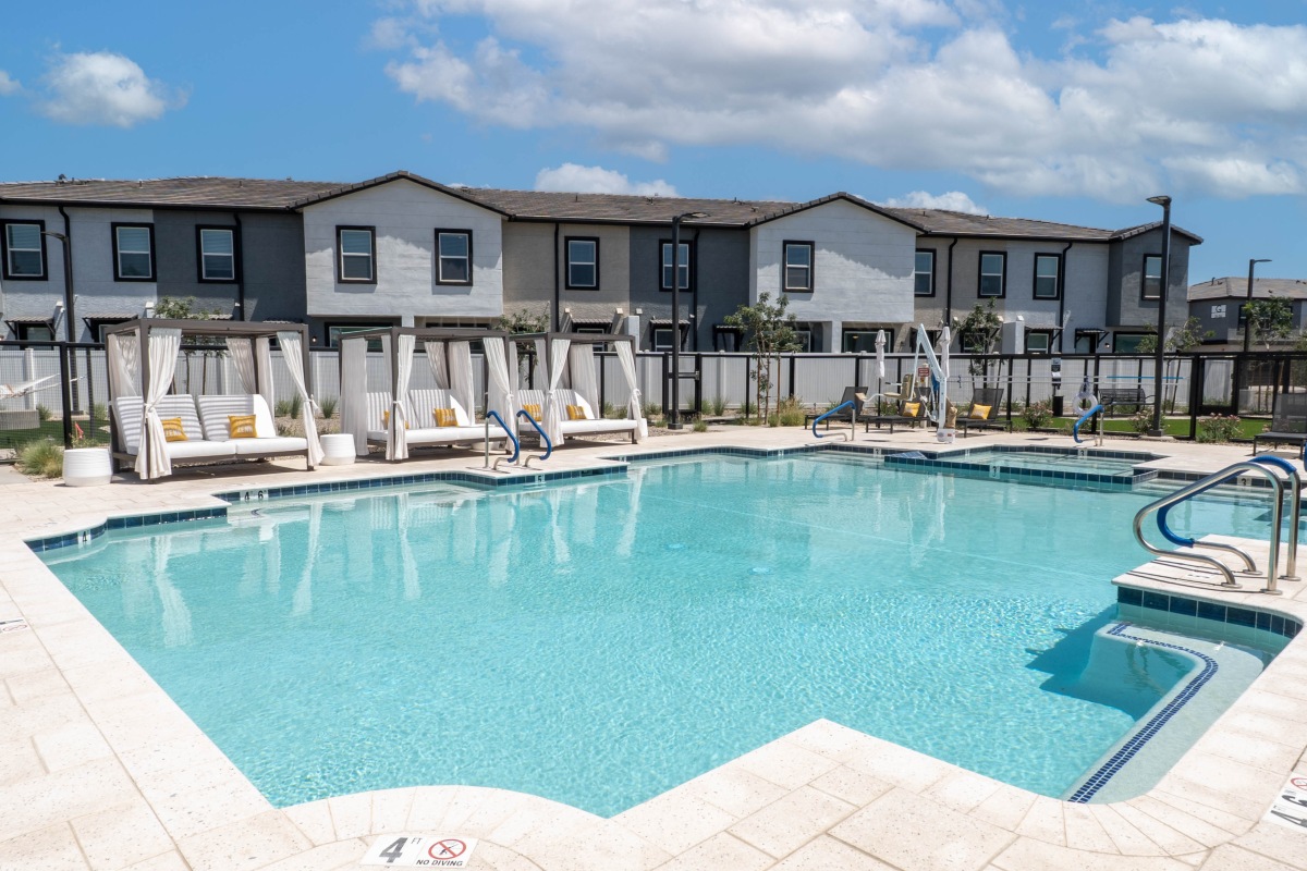 Resort-style pool and hot tub at Zenn Skyview