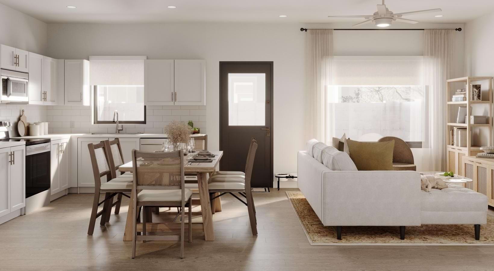 Open kitchen, dining, and living areas